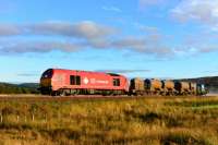 With the jets blasting, 67018 Keith Heller works the rail head treatment train back to Inverness from Moy on a sunny October afternoon.<br><br>[John Gray 13/10/2015]