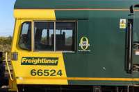 Close up of the cab of Freightliner 66524, including a Health and Safety reminder to staff alongside the driver's window. The loco was passing through Didcot on an infrastructure working to Southampton. <br><br>[Peter Todd 08/10/2015]