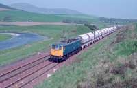 Limestone empties from Ravenscraig heading south to Hardendale Quarry passing Roberton, south of Lamington, in 1988<br><br>[Ewan Crawford //1988]