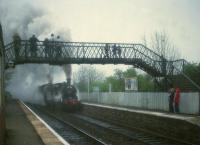 NB 0-6-0 673 <I>Maude</I> and LNER 4-4-0 246 <I>Morayshire</I> passing Kingsknowe station with the S.L.O.A. North Briton railtour on 10th May 1981. This was the second day of a two day tour and this leg ran from Larbert into Edinburgh, round the suburban line and then out to Mossend via Shotts. The previous day A4 60009 had failed while hauling the tour.  <br><br>[Peter Todd 10/05/1981]