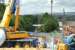 Looking towards Bolton from above the tunnel on 17 July 2015. With the positioning of the crane in the foreground it is no longer possible to reach the location seen in Image 51514. A northbound Class 150 DMU can be seen below.<br><br>[John McIntyre 17/07/2015]