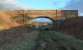 Minnivey Bridge looking towards Dalmellington in 2004. Two tracks existing here - the G&SW line and the DICo's second track which ran from west of Waterside to Sillyhole, just shy of Dalmellington Signal Box. The line was originally single track.<br><br>[Ewan Crawford //2004]