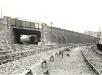 Looking east towards Coatbridge Sunnyside station on 26 August 1958 as V1 67621 prepares to restart an Airdrie - Partickhill train. On the right the freight only line to Whifflet turns south. <br><br>[G H Robin collection by courtesy of the Mitchell Library, Glasgow 26/08/1958]