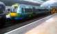 Borders - liveried unit 170414 at Glasgow Queen Street on 14 August 2015.<br><br>[John Yellowlees 14/08/2015]