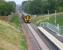 Peaceful scene at Eskbank on 8 September 2015 as 158712+158738 approach the platform with a morning service to Tweedbank. The up platform of the original Eskbank station (closed 1969) is visible immediately beyond the still smoke-stained A6094 road bridge in the background.  <br><br>[John Furnevel 08/09/2015]