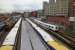 An elevated view of Vancouver Waterfront Station on September 25th shows a variety of freight wagons and 5 sets of stabled West Coast Express push-pull double-deck stock.  The latter will work the series of trains out to Mission City in the late afternoon.  To the right, a driverless Skytrain unit can be seen entering the turnback siding prior to its next journey to either King George or VCC Clark from the adjacent Expo/Millennium line station.<br><br>[Malcolm Chattwood 25/09/2015]