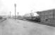 A Rutherglen - Balloch train leaving Dalmuir Riverside station on 23 June 1959. The locomotive is Polmadie shed's Fairburn 2-6-4T no 42057. The photograph is taken from the terminal platforms used for worker's trains. <br><br>[G H Robin collection by courtesy of the Mitchell Library, Glasgow 23/06/1959]