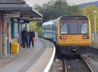 Pacer 142080 awaits departure at Merthyr Tydfil with the 18.08 to Cardiff Central and Barry Island on 20 October 2015. The eight mile branch from Abercynon is single line except for an extended loop at Merthyr Vale.<br><br>[Bill Roberton 20/10/2015]