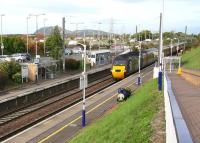 The Sunday 1008 CrossCountry Edinburgh - Penzance service, formed by an HST, runs through Musselburgh on 25 October 2015. The train is approximately 5 minutes into its ten and a half hour journey. <br><br>[John Furnevel 25/10/2015]