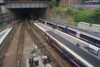 Looking at the station throat of Glasgow Queen St High Level from the road bridge on Cathedral St on 02 August 2015. <br><br>[John McIntyre 02/08/2015]