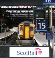 ScotRail 156450 stands at the buffer stops at Waverley platform 15, adjacent to a neat and tidy west end concourse, during a quiet period on 29 October 2006 [see image 8251].<br><br>[John Furnevel 29/10/2006]