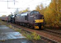 The empty coaching stock movement from Fort William to Carnforth on the Saturday the 24th of October passing through Coatbridge Central some two hours late.<br><br>[Alastair McLellan 24/10/2015]