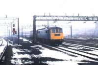 An up WCML express about to run south through Rugby on a snowy March day in 1979. [Ref query 5976]<br><br>[John Furnevel 12/03/1979]