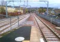 The reinstated Knightswood South Junction at Anniesland, seen from the end of the bay platform in November 2015. The line on the right was effectively a siding from Maryhill before the new link to the Westerton to Hyndland tracks was constructed.  <br><br>[John Yellowlees 12/11/2015]