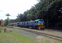 Two colourful locos at the head of the 15.30 train to Cairns wait for departure time at Kuranda in Queensland.<br><br>[Colin Miller 27/09/2015]
