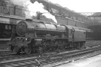 Royal Scot 46167 <I>The Hertfordshire Regiment</I> preparing to back onto the 1225 train to Lockerbie at Glasgow Central on 23 June 1962. <br><br>[John Robin 23/06/1962]