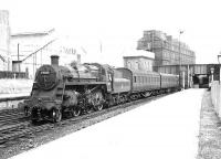 BR Standard Mogul 77015 at the south end of Ayr station on 8 August 1955 with empty stock. <br><br>[G H Robin collection by courtesy of the Mitchell Library, Glasgow 08/08/1955]