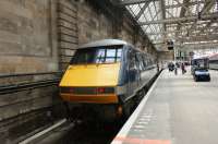 91102 waits at the buffers on platform 1 at Glasgow Central on 27 July 2009 with an east coast service during the National Express era.<br><br>[John McIntyre 27/07/2009]