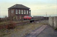 Tay Bridge South box viewed from the platforms of the closed Wormit station in 1989. Perhaps the signalman likes red cars [see image 3990] for a similar view 16 years later, by which time the box was painted red.<br><br>[Ewan Crawford //1989]