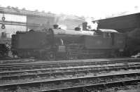 Looking south across the shed yard at Heaton around 1960 with V3 67605 in the foreground. The ECML runs behind the camera and the wall of Parsons Engineering works on Shields Road forms the backdrop, standing just beyond the North Tyneside electrified lines. <br><br>[K A Gray //1960]