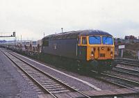 56040 running into Westbury Station with a loaded stone  train.<br><br>[Peter Todd 17/12/1982]