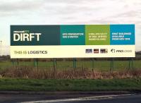 I may be losing count, but I think this hoarding, adjacent to the A5 Southbound, foreshadows DIRFT terminal 4. This will need an overbridge across the A5 similar to that over the A428, and an extension of the existing embankment past DIRFT 3 [see image 52516].<br><br>[Ken Strachan 04/12/2015]