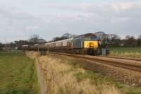 WCRC 57316 heads west from Mintholme LC towards Gregson Lane with a charter train on 20 April 2013. Bringing up the rear was 57601.<br><br>[John McIntyre 20/04/2013]