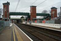 A view north towards Preston along platform 1 at Leyland on 26 December 2015 with the new footbridge in place and the three lift shafts now dominating the skyline. <br><br>[John McIntyre 26/12/2015]