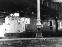 A cross platform shot of 5411 waiting to leave Waverley on the evening of 10 October 1972 on the west end of a push-pull shuttle service to Glasgow Queen Street. [See image 4642]<br><br>[John Furnevel 10/10/1972]