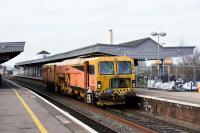 Colas Rail <I>Plasser & Theurer</I> Switch & Crossing Tamper machine DR73935 passing through Didcot station on 23rd December 2015.<br><br>[Peter Todd 23/12/2015]