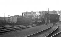 Part of the shed yard at 31A Cambridge in May 1961. The three locomotives in the centre are (left to right) Britannia 70007 <I>Coeur-de-Lion</I>, a visitor from Norwich; B1 61286, of Stratford shed and home based B1 61287. Cambridge shed officially closed in June 1962. [See image 34801] <br><br>[K A Gray 14/05/1961]