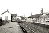 General view of Cardross station looking west towards Helensburgh on 26 October 1957, showing the original buildings and platform height.<br><br>[G H Robin collection by courtesy of the Mitchell Library, Glasgow 26/10/1957]