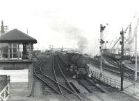 Corkerhill Black 5 45007 about to pass Ardrossan Harbour signal box on 6 July 1959 with a Winton Pier - St Enoch express.<br><br>[G H Robin collection by courtesy of the Mitchell Library, Glasgow 06/07/1959]