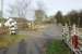 The level crossing at Tillyeve on the Buchan line, between Newmachar and Udny. The gates and posts are in surprisingly good condition given that passenger traffic ceased in 1965 and the line closed completely in 1979. The crossing keepers cottage is on the left. This view looks north to nearby Udny in November 2015. <br><br>[Brian Taylor 14/11/2015]