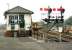 Platform scene at Par on 1 June 2002, with a DMU approaching the station off the Newquay line.<br><br>[Ian Dinmore 01/06/2002]