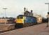 47244 westbound with stone empties, bound for the Somerset quarries.<br><br>[Peter Todd 18/01/1983]