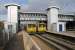 GWR <I>Castle Class</I> hauled expresses from Birkenhead to Paddington once called at Hooton's platforms. These days the 3rd rail motive power is humbler, but calls a lot more frequently. Merseyrail 507005 and 508123 pause underneath the new accessible footbridge in November 2015.<br><br>[Mark Bartlett 16/11/2015]