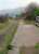 Dollar, looking to Alloa, in 1991. This shows the section of platform which was covered by a shelter [see image 27868]. The ballast was relatively intact at the time but trackbed has since been converted into a 'tarmaced' footpath.<br><br>[Ewan Crawford //1991]