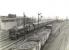 Royal Scot 46104 <I>Scottish Borderer</I> runs past Polmadie shed on 14 May 1960 at the head of a Liverpool / Manchester - Glasgow Central train. <br><br>[G H Robin collection by courtesy of the Mitchell Library, Glasgow 14/05/1960]