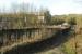 The Middle Peak Quarry loading point is to the left (with the quarry even further to the left connected by conveyor) in this 2005 view looking to what is now Ravenstor station.<br><br>[Ewan Crawford 13/01/2005]