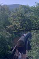 On what was a blisteringly hot summer day in 1990, a 47 heads north over the Killiecrankie Viaduct before plunging into the tunnel below the photographer. At the time there was no footpath to this location, it's much easier now!<br><br>[Ewan Crawford //1990]