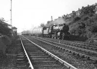 A Singer - Springburn workmen's train passing Knightswood North Junction on 24 May 1957 behind Ivatt 2-6-0 43135.<br><br>[G H Robin collection by courtesy of the Mitchell Library, Glasgow 24/05/1957]