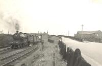 A fish train leaving Fraserburgh on 5 July 1950 hauled by Holden ex-GER B12 4-6-0 no 61552.<br><br>[G H Robin collection by courtesy of the Mitchell Library, Glasgow 05/07/1950]