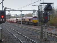 DBS 66104 and 66102 near Cardonald with a very long Didcot - Mossend car train, diverted off the WCML.<br><br>[Bill Roberton
 09/02/2016]