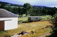 A railbus, leaving Blacksboat station westbound, passes the goods shed in 1964. [See image 54204].<br><br>[Andrew Saunders /08/1964]