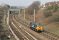 Going on standby at Preston as the duty <I>Thunderbird</I>, 57310 <I>Pride of Cumbria</I> ran light engine from Crewe Gresty Bridge on 16th February 2016 and is seen here passing Farington Curve Junction. <br><br>[Mark Bartlett 16/02/2016]