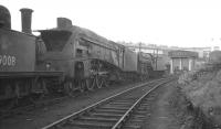 A group of withdrawn steam locomotives stored awaiting disposal in the sidings at Heaton shed in 1964. A3 Pacific 60070 <I>Gladiateur</I> and A4 60002 <I>Sir Murrough Wilson</I> (minus nameplates) stand together with J72 0-6-0T 69008.<br><br>[K A Gray //1964]