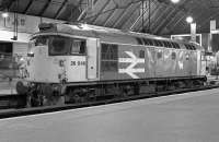 26040 takes a break from pilot duties at Glasgow Queen Street in 1989.  The loco was moved from storage at Methil to Whitrope Railway Centre in early March 2016.<br><br>[Bill Roberton //1989]