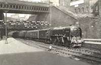 The Leeds City-Glasgow Queen Street <I>'North Briton'</I> arrives at its destination on 11 September 1958. At the head of the train is Haymarket A2 Pacific no 60509 <I>Waverley</I>. <br><br>[G H Robin collection by courtesy of the Mitchell Library, Glasgow 11/09/1958]
