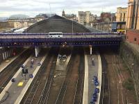 View of Queen Street High Level station from the Buchanan Galleries on 21st March 2016. A rail trolley is just visible on the left under the bridge at platform 7. Otherwise, only the lack of  passenger trains and the bags of cables on the platforms show that work is in progress.<br><br>[Colin McDonald 21/03/2016]